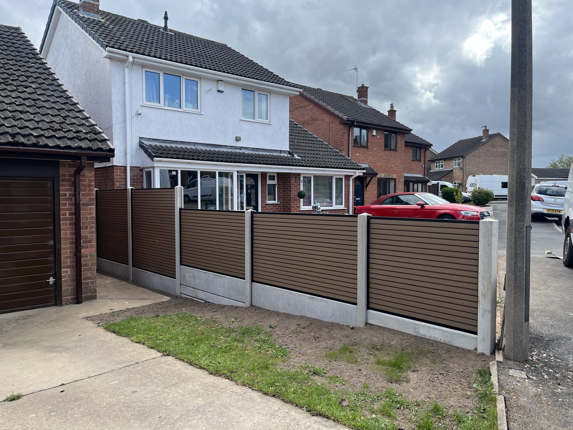 Hedge removal and new fence installation.